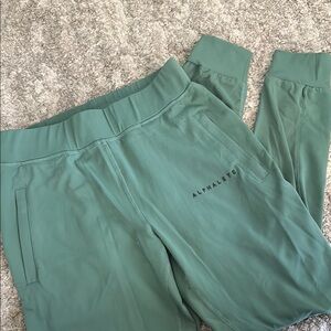 Alphalete Green Track Pants with Elastic Waistband and Relaxed Fit
